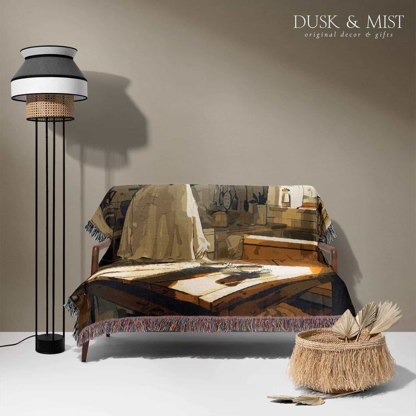 Woven cotton blanket depicting a ghost standing in a vintage kitchen with sunlight streaming through the window onto a wooden table with two teacups.