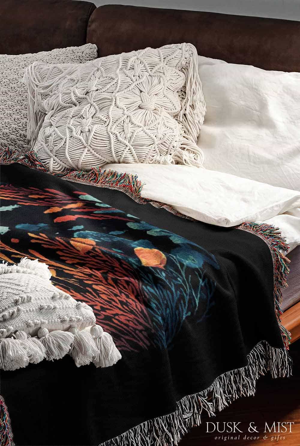 Blanket with whale shark and ocean life design on a black background