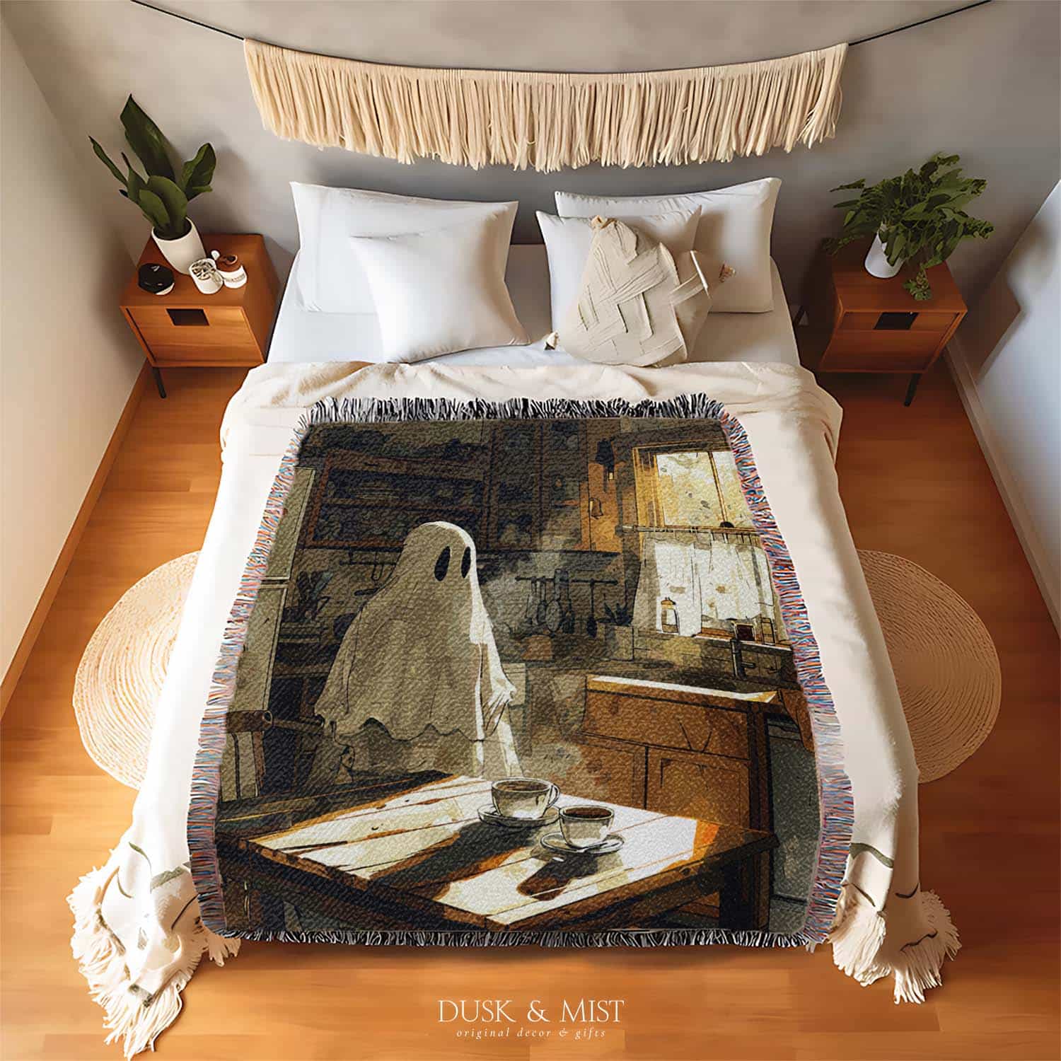 Woven cotton blanket depicting a ghost standing in a vintage kitchen with sunlight streaming through the window onto a wooden table with two teacups.