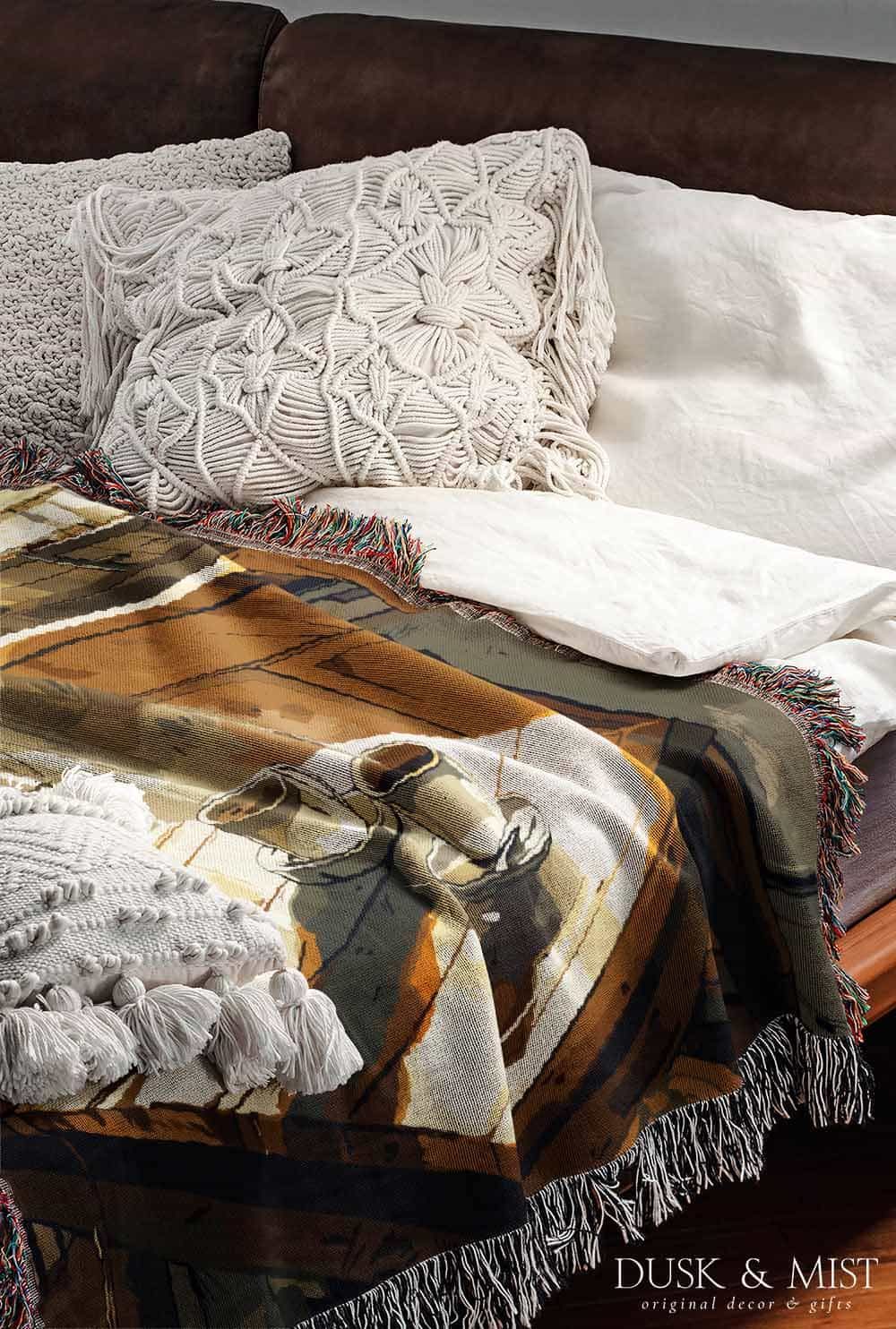 Woven cotton blanket depicting a ghost standing in a vintage kitchen with sunlight streaming through the window onto a wooden table with two teacups.
