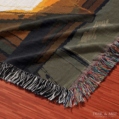 Woven cotton blanket depicting a ghost standing in a vintage kitchen with sunlight streaming through the window onto a wooden table with two teacups.