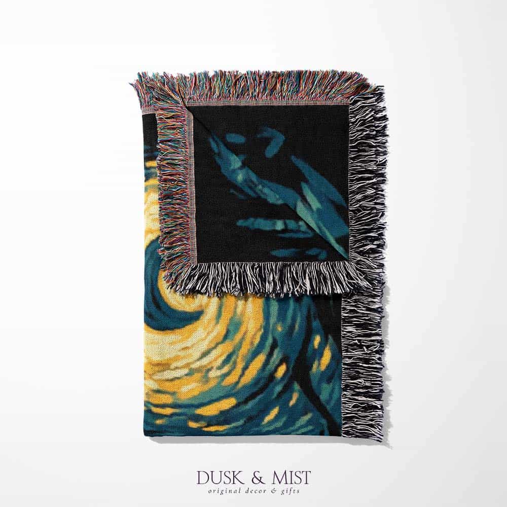 Woven cotton blanket featuring Bigfoot in a forest beneath a Van Gogh-style starry night sky with swirling constellations and moonlight.