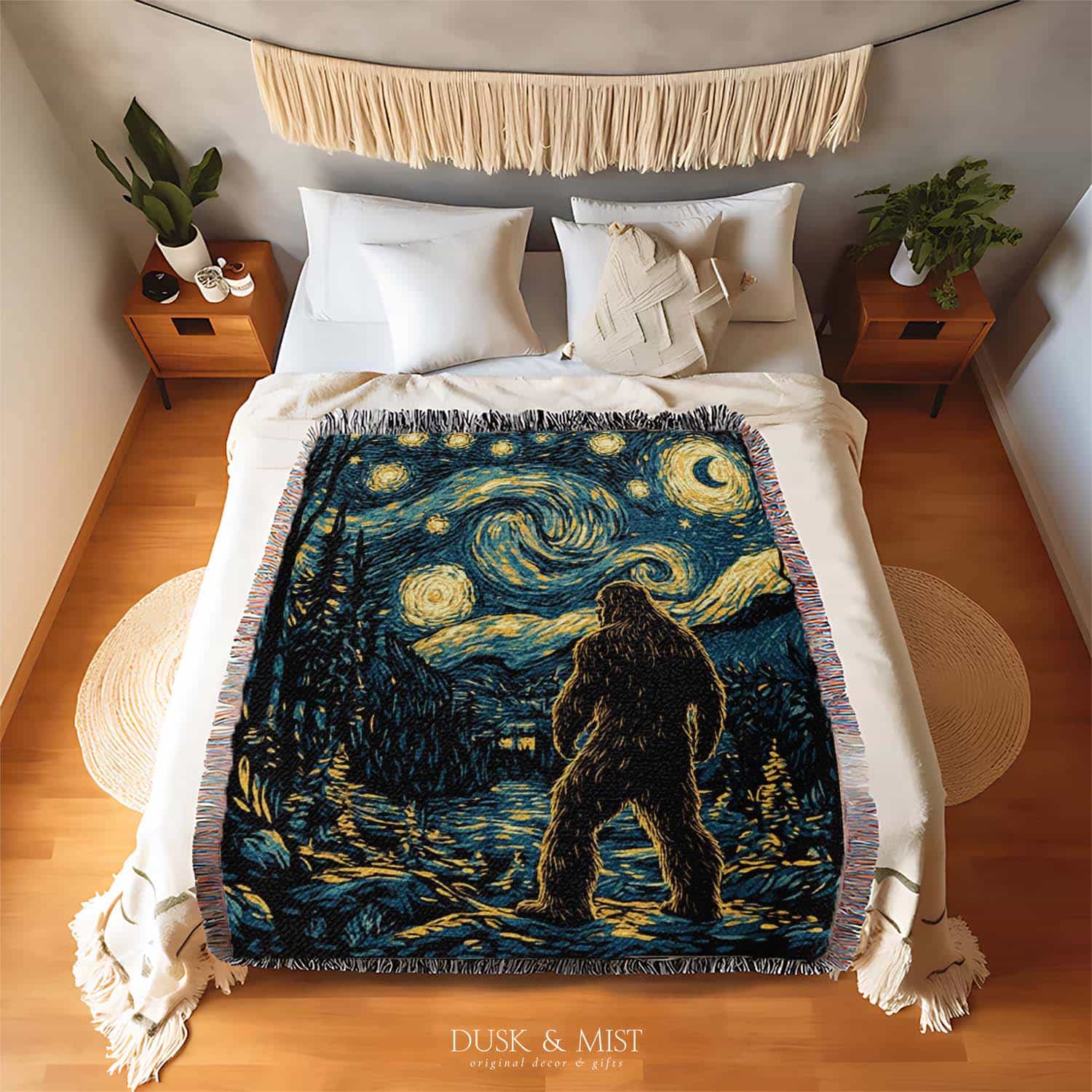 Woven cotton blanket featuring Bigfoot in a forest beneath a Van Gogh-style starry night sky with swirling constellations and moonlight.