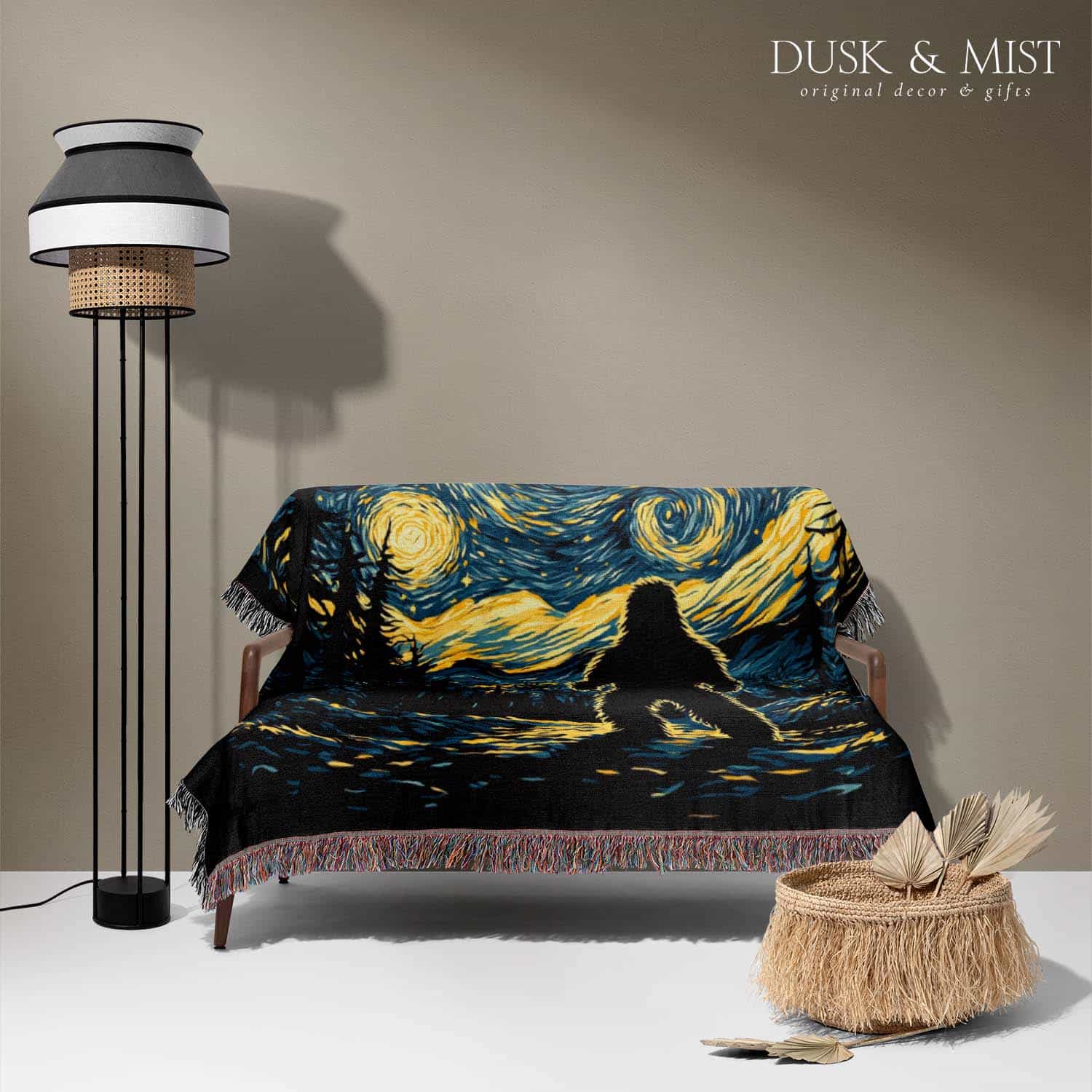 Woven cotton blanket featuring Bigfoot in silhouette against a Van Gogh-style starry night sky with swirling golden stars and dark forest trees.