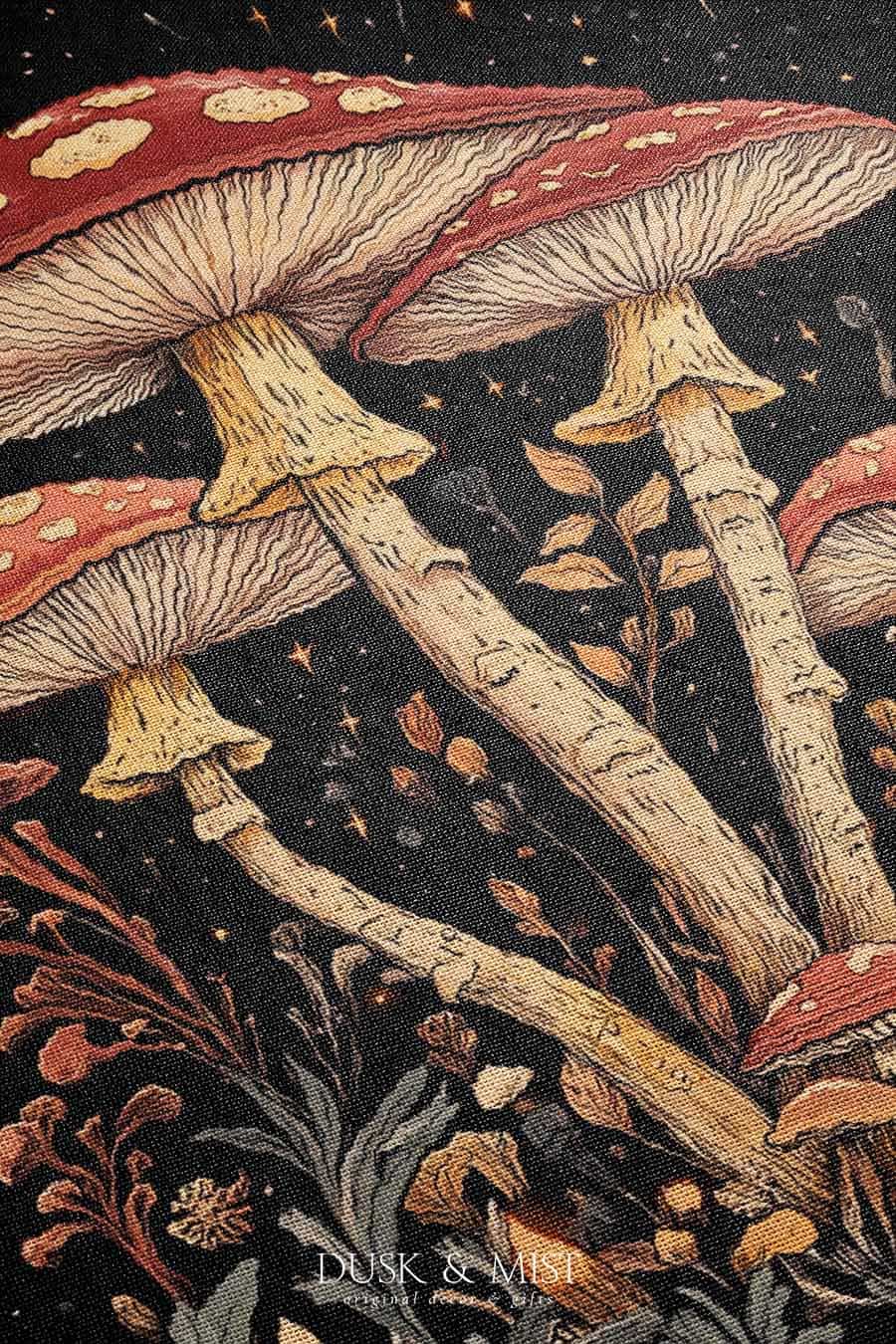 Woven cotton blanket featuring tall red-capped mushrooms under a starry sky with golden stars and surrounding plants on a black background.