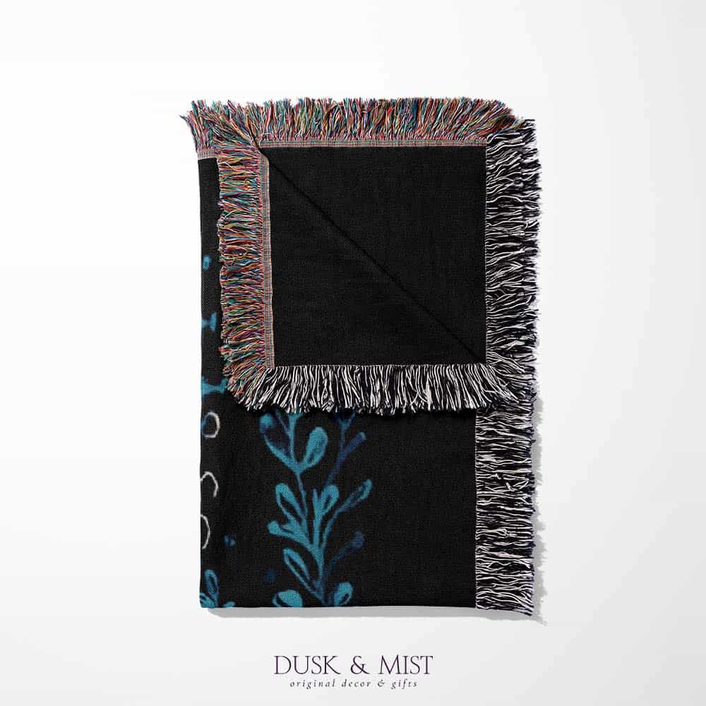 Blanket with whale shark and underwater scene design on a black background