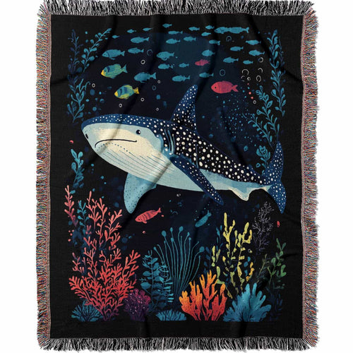 Blanket with whale shark and underwater scene design on a black background