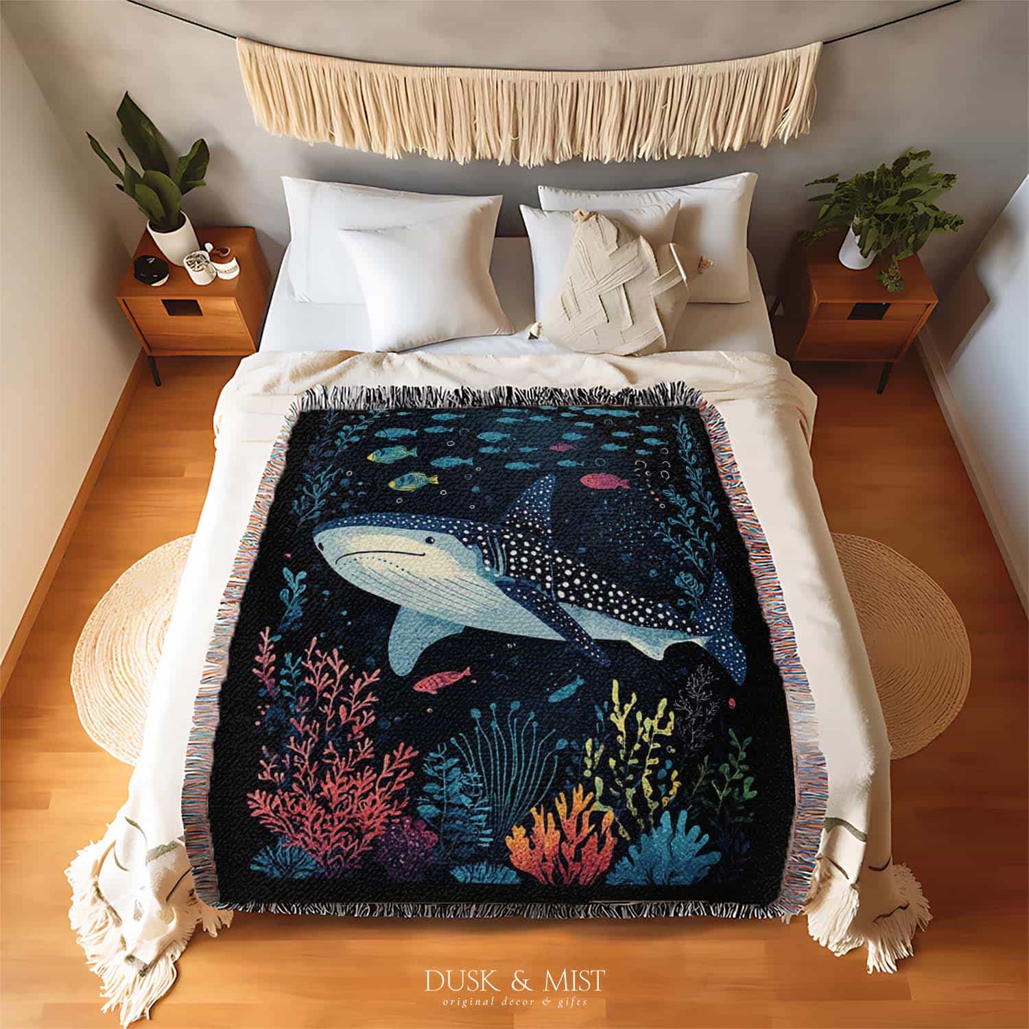 Blanket with whale shark and underwater scene design on a black background