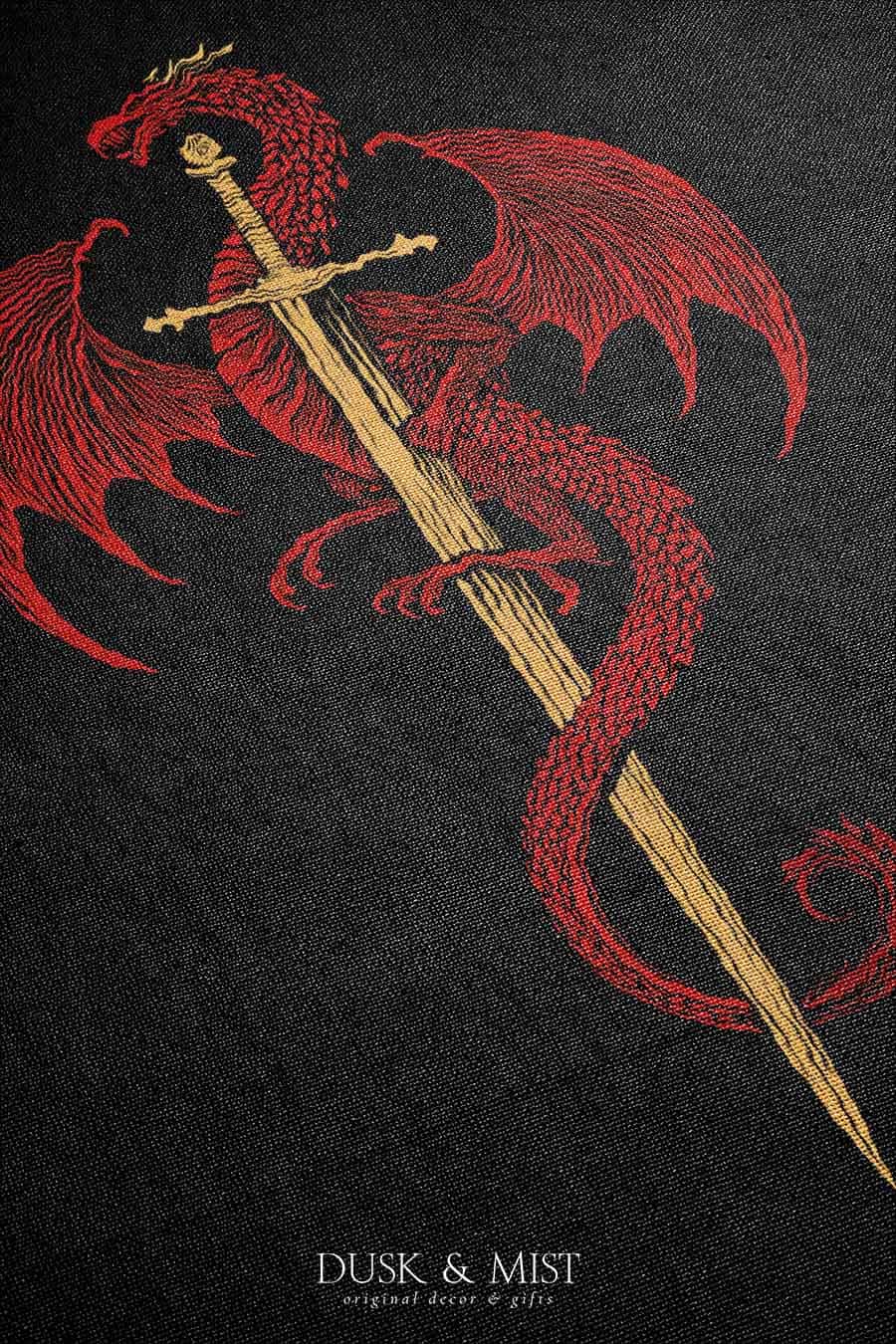 Woven cotton blanket featuring a red dragon wrapped around a golden sword on a black background with intricate wing and scale details.