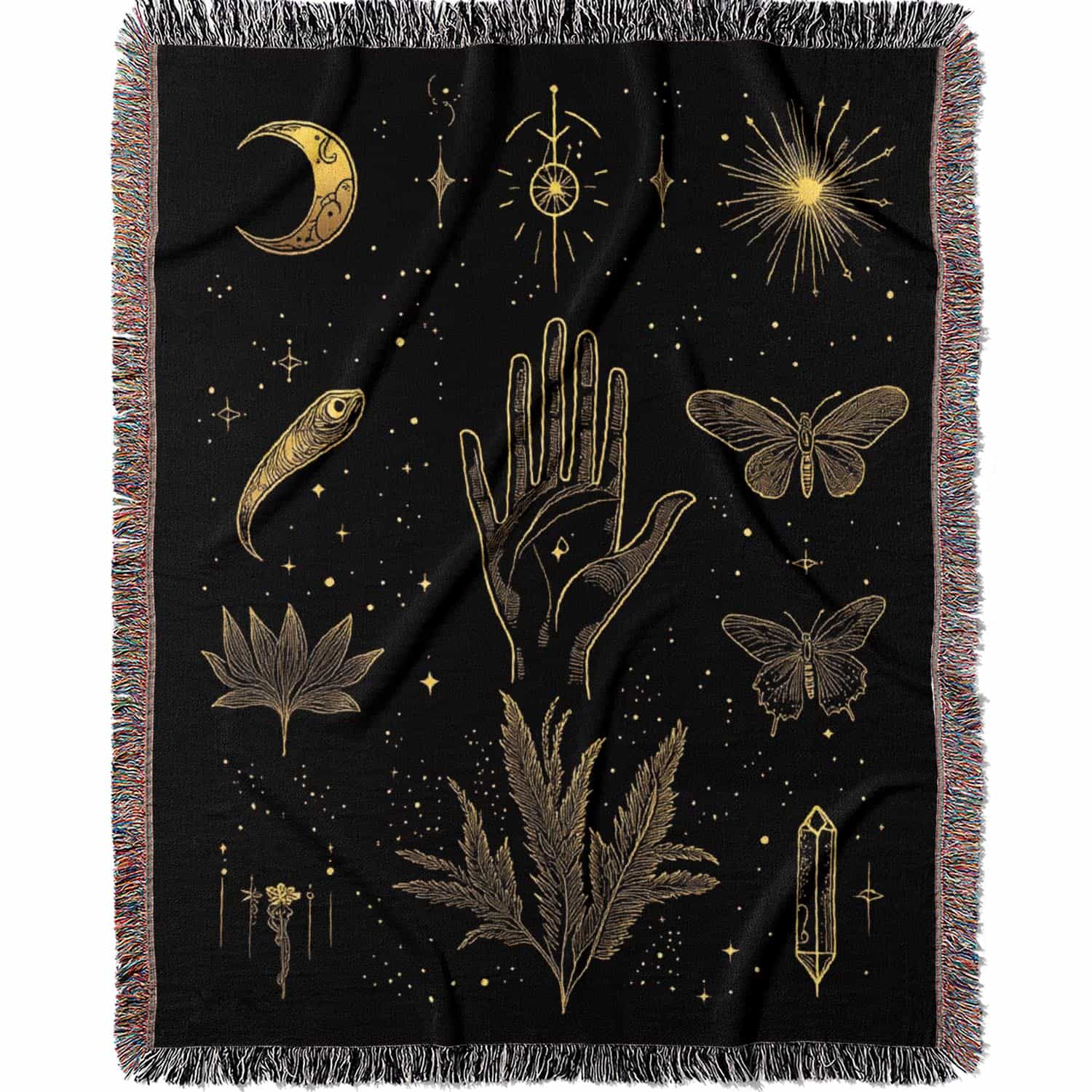 Woven cotton blanket with golden occult illustrations — palmistry hand, crescent moon, moth, snake, crystals, plants, and celestial symbols on a black background.