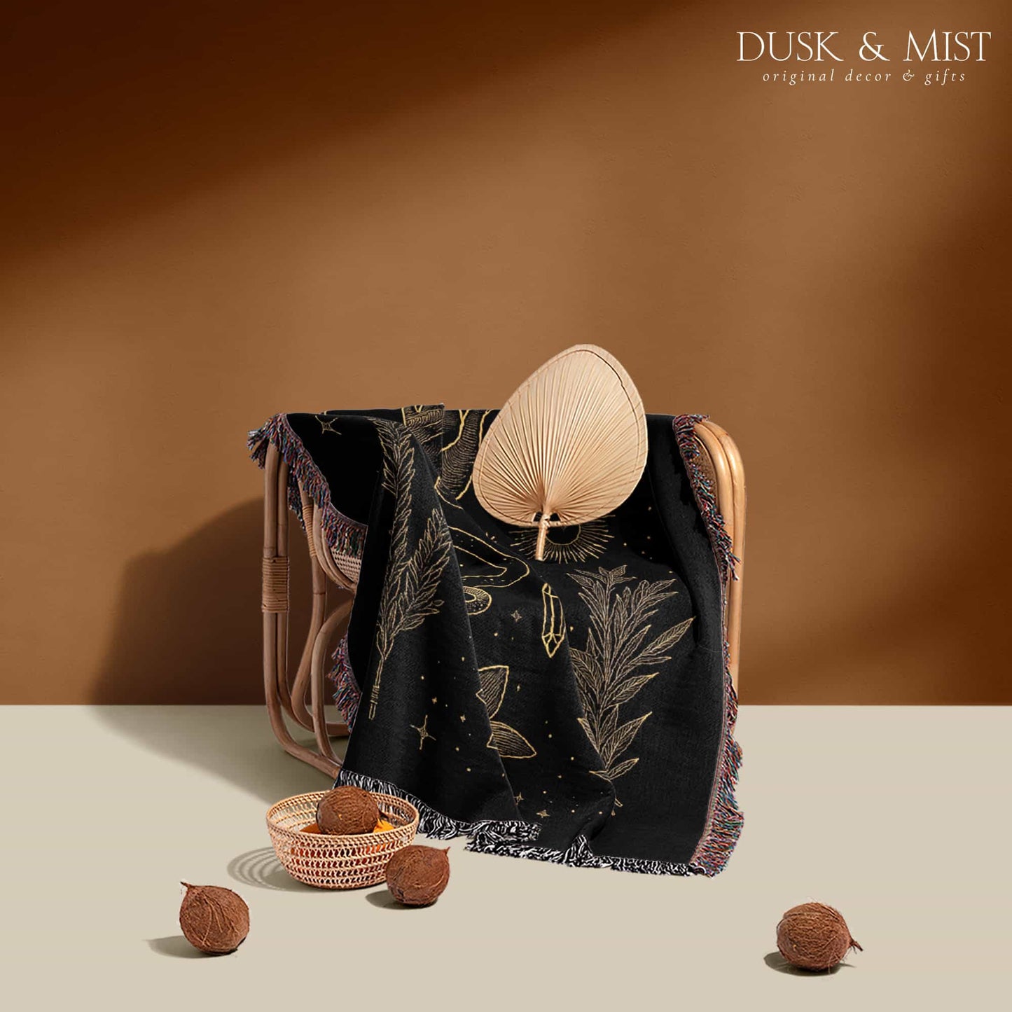 black throw blanket with gold celestial and occult designs
