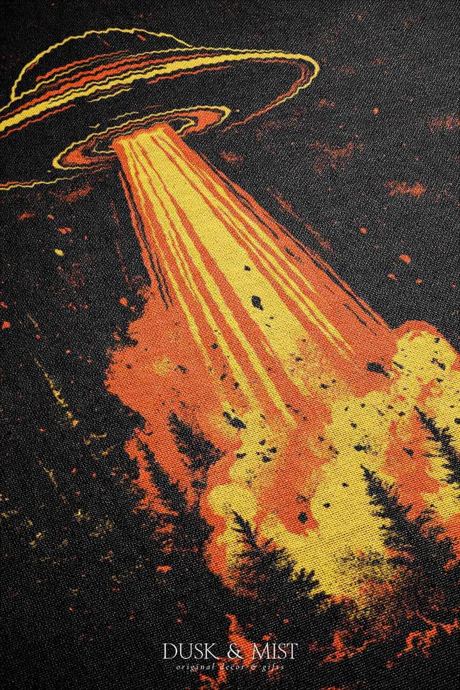 Woven cotton blanket featuring a UFO with a fiery orange beam blasting into a dark forest, with glowing explosions and cosmic night details.