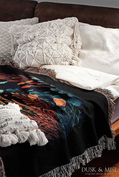 Blanket with whale shark and ocean life design on a black background
