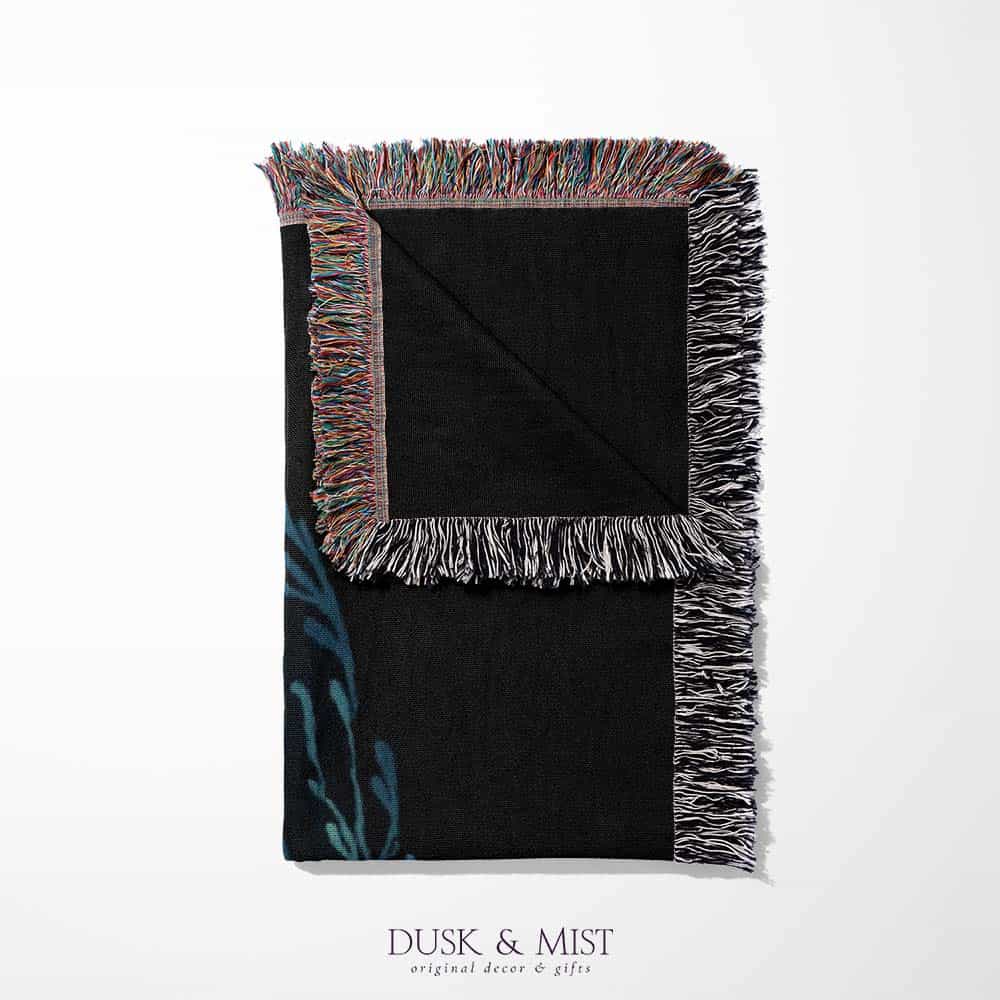 Blanket with whale shark and ocean life design on a black background