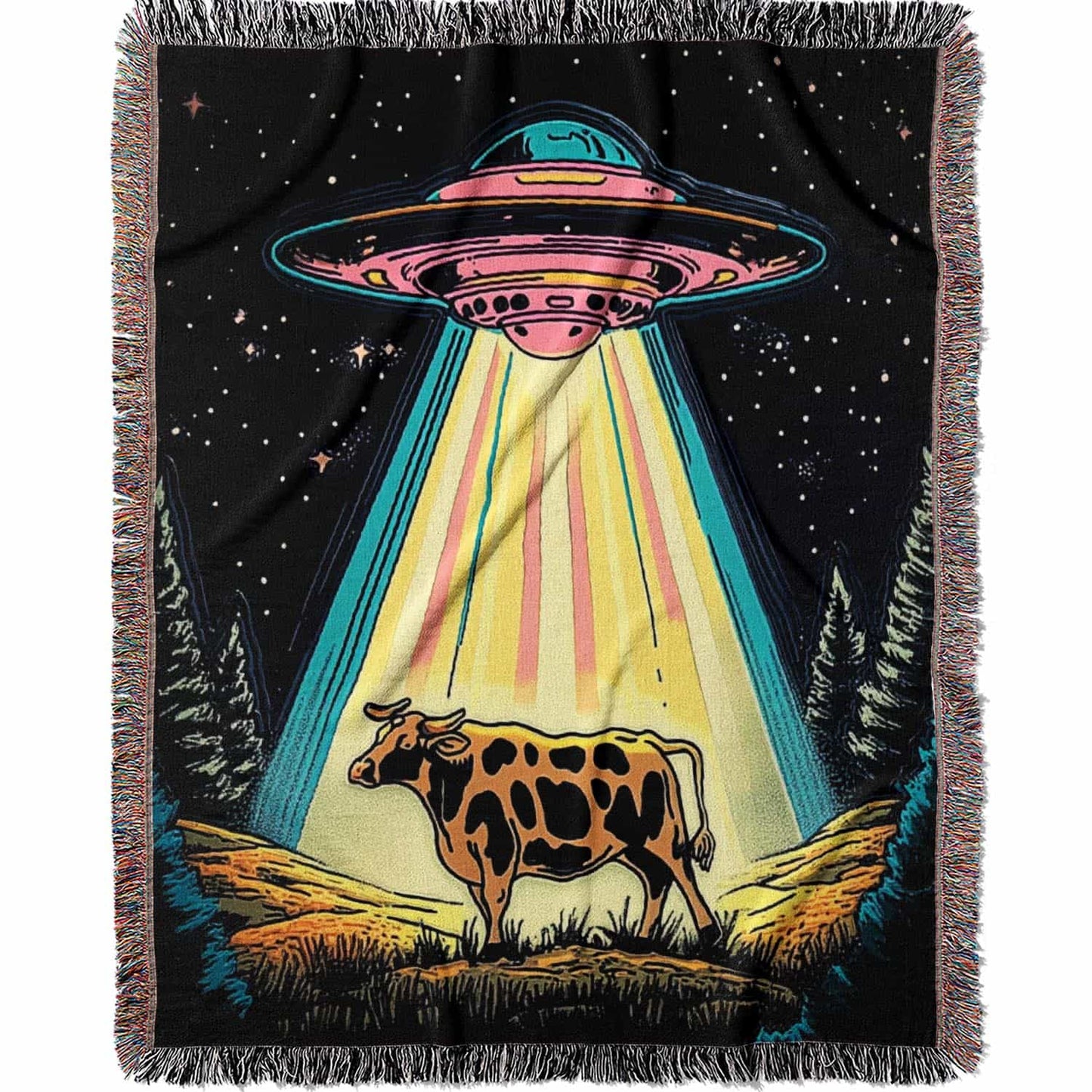 Blanket with a UFO abduction of a cow design against a starry night sky.